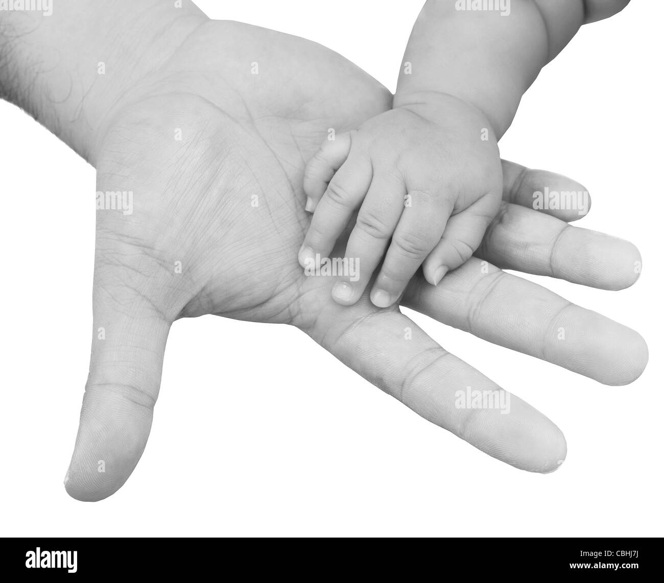 adult hand holding a baby hand closeup, black and white Stock Photo