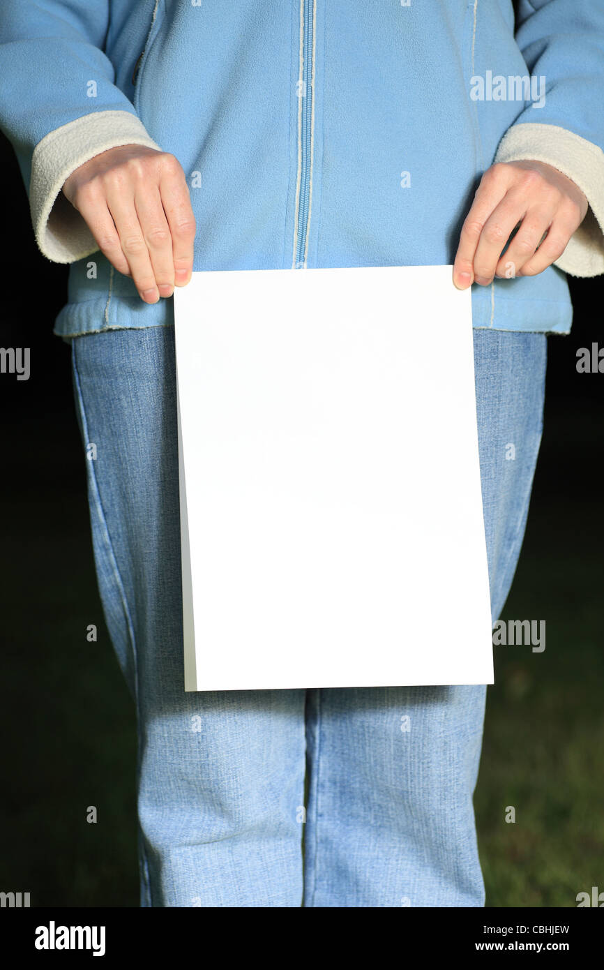 woman with blank paper outdoor Stock Photo - Alamy