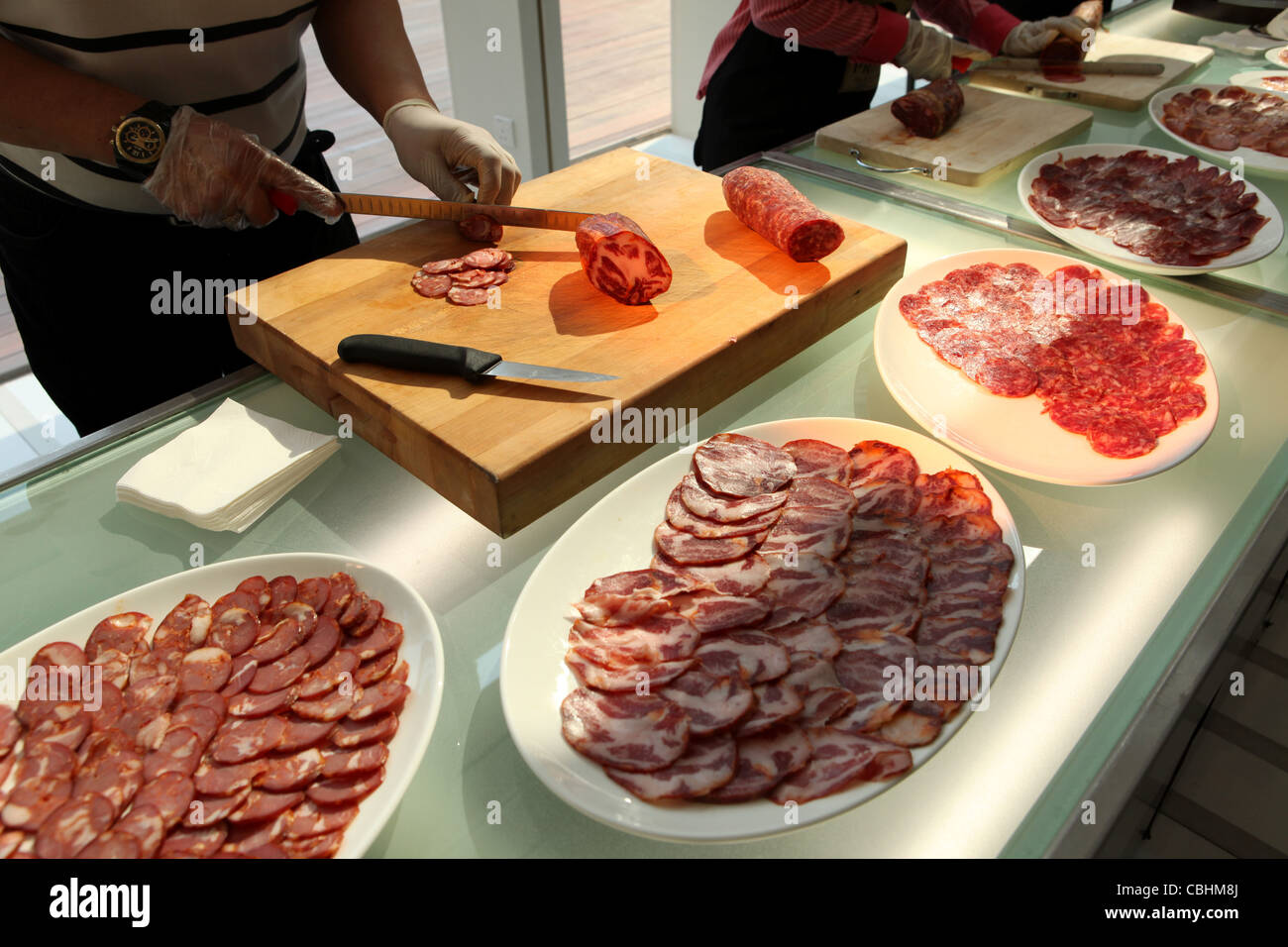 Cutting Proscuitto, Parma Ham, Pata Negra Ham Stock Photo