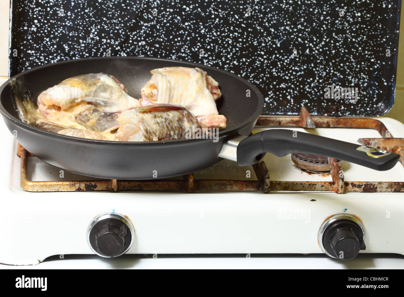 to panfry sth Raw cod fish fillets in kitchen Stock Photo Alamy