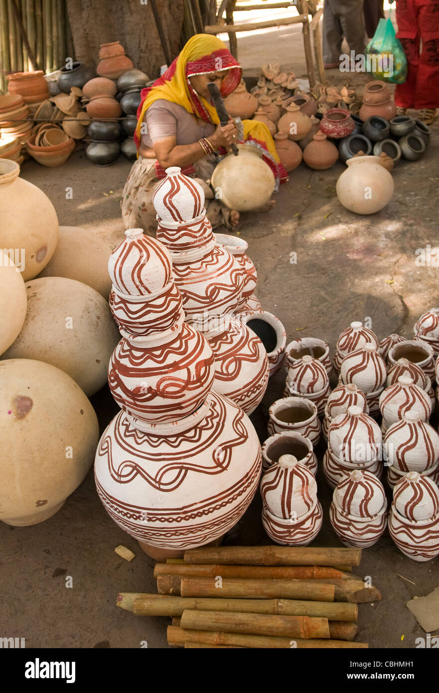 A Rajasthani woman working on traditional pottery Stock Photo - Alamy