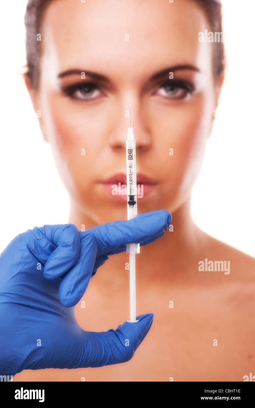 woman holding a syringe Stock Photo Alamy