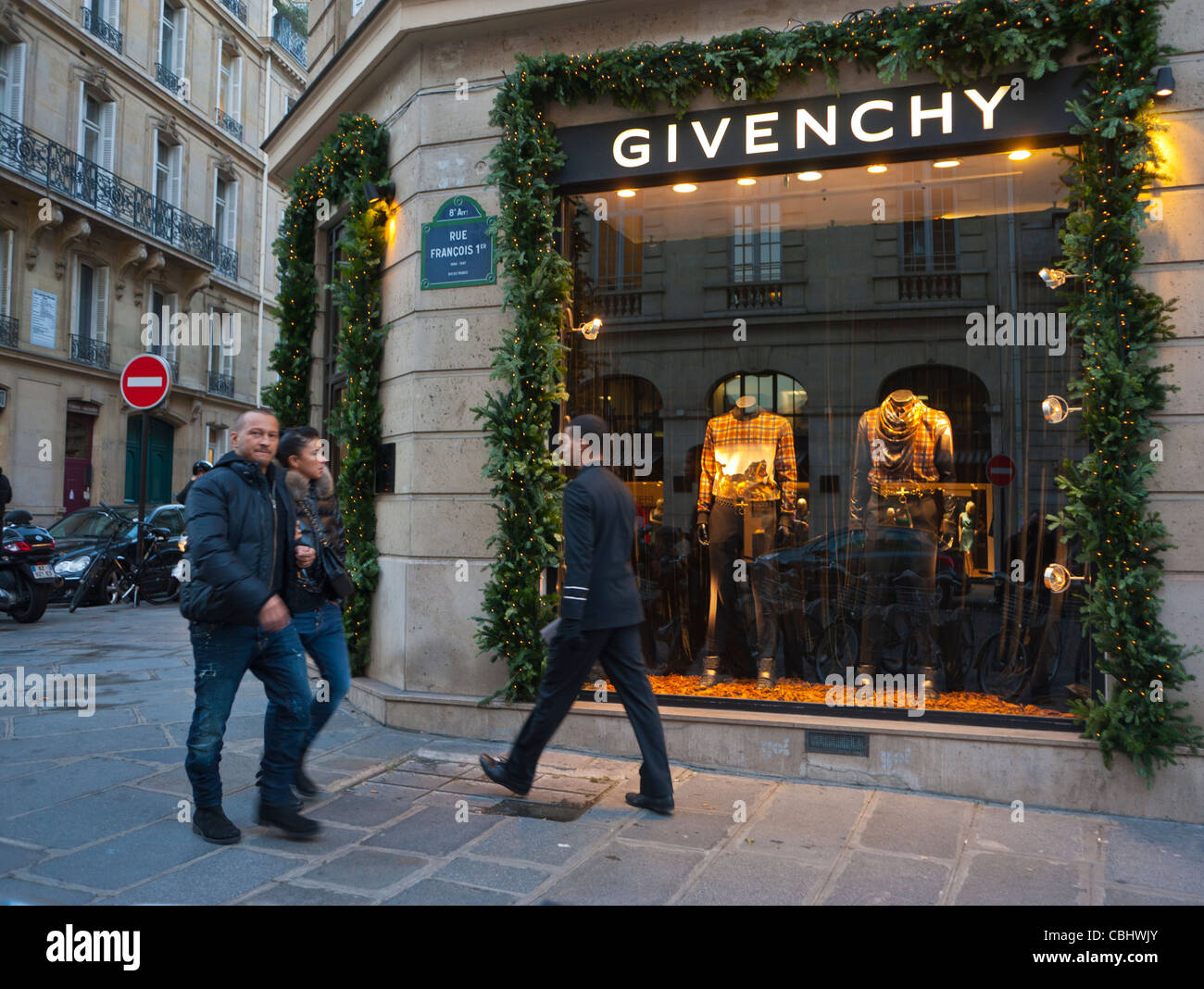 Paris, France, People Walking front, Luxury Christmas Shopping, Givenchy Clothing Store Front Window, Sign, Rich Products Stock Photo