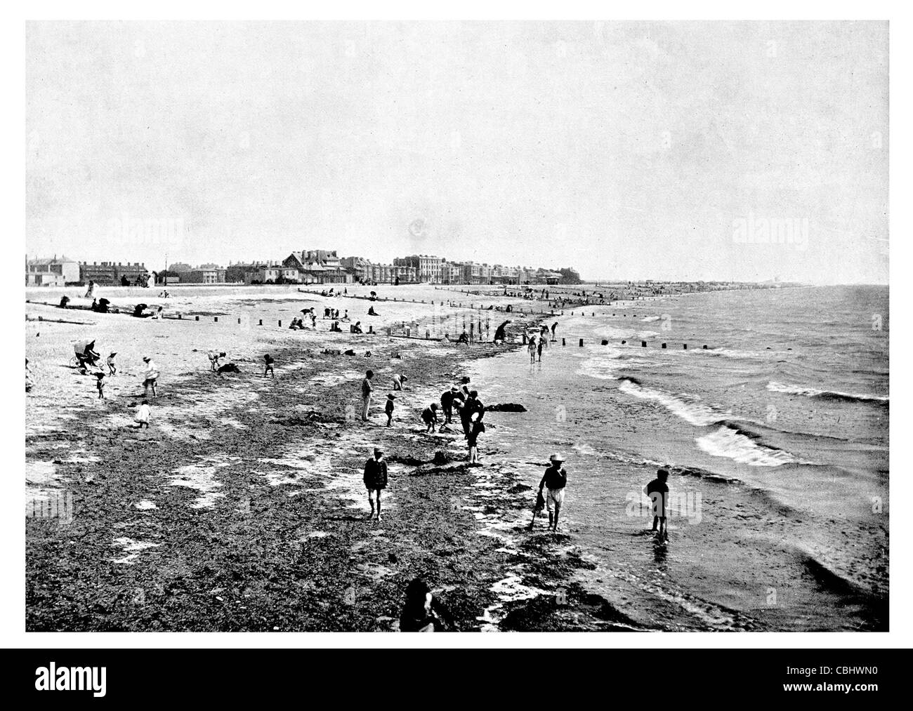 Paddling low tide Littlehampton seaside resort West Sussex England beach swimming bathing summer Stock Photo