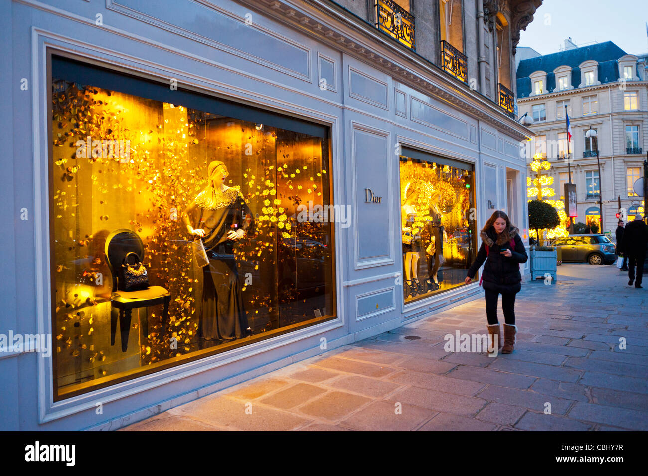 Paris, France, Luxury Christmas Shopping, Christian Dior Store, Woman Walking past Shop Windows, dior dress, dior 30 avenue montaigne, storefront Stock Photo