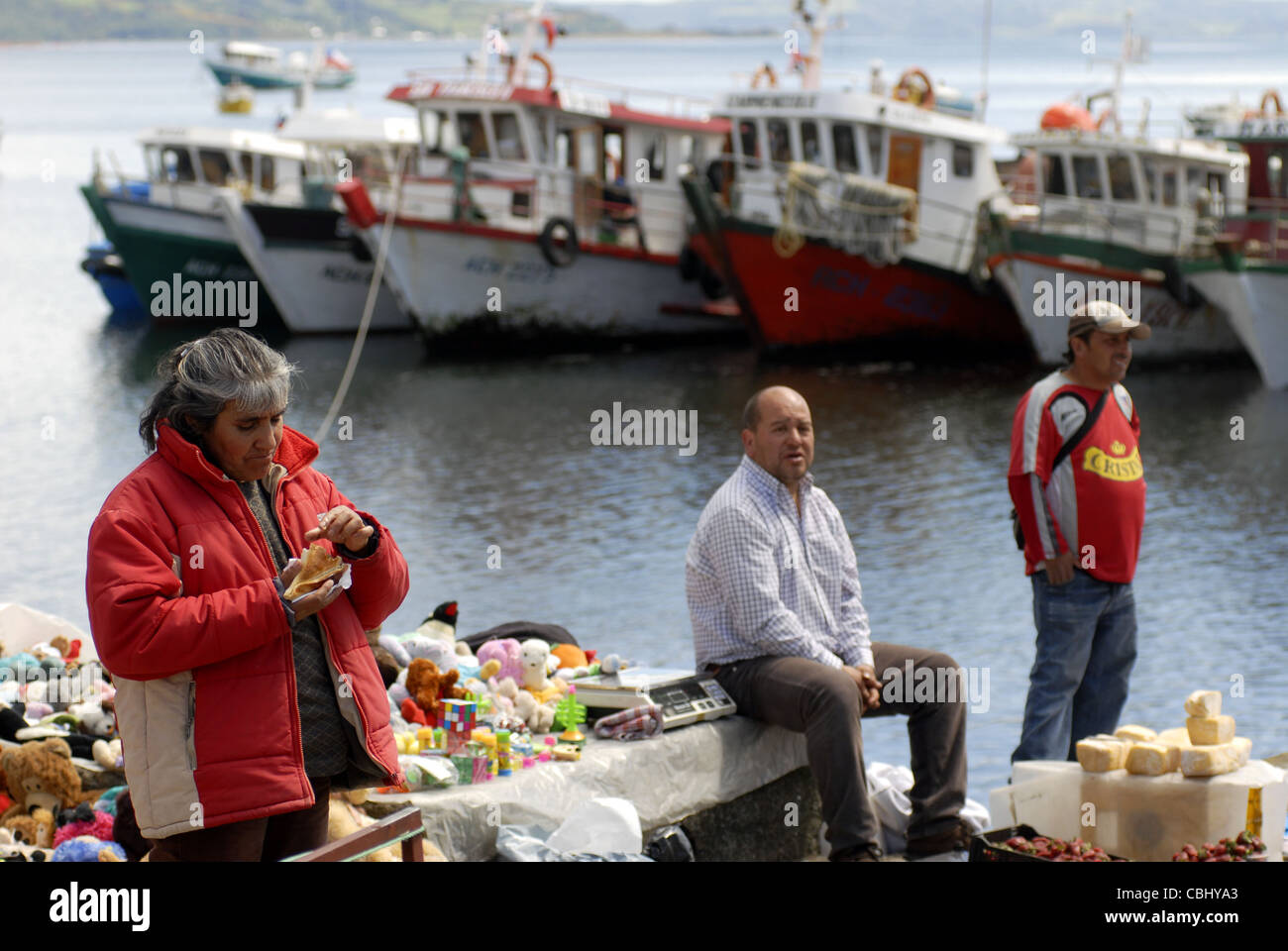 People at the Harbour of Achao,  Quinchao Island, Chiloe, Lake's District, Chile Stock Photo