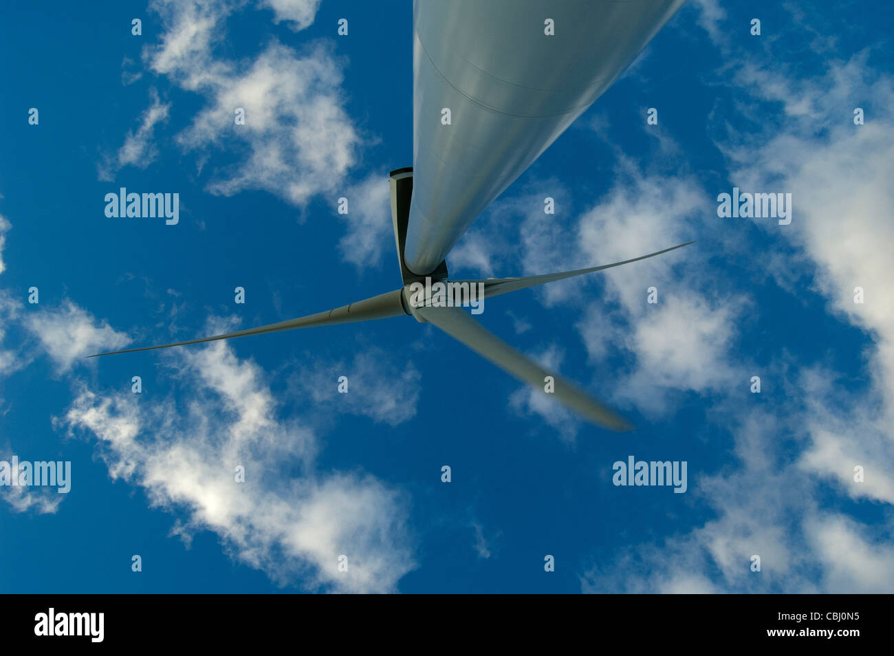 Cloudy sky with a view of wind turbines Stock Photo - Alamy