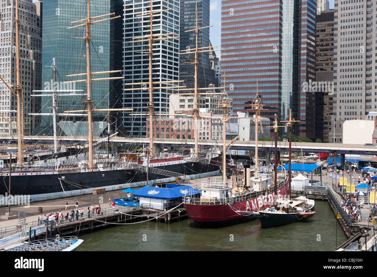 Ambrose light ship and other vintage ships docked at the South Street Seaport Museum in New York City. Stock Photo