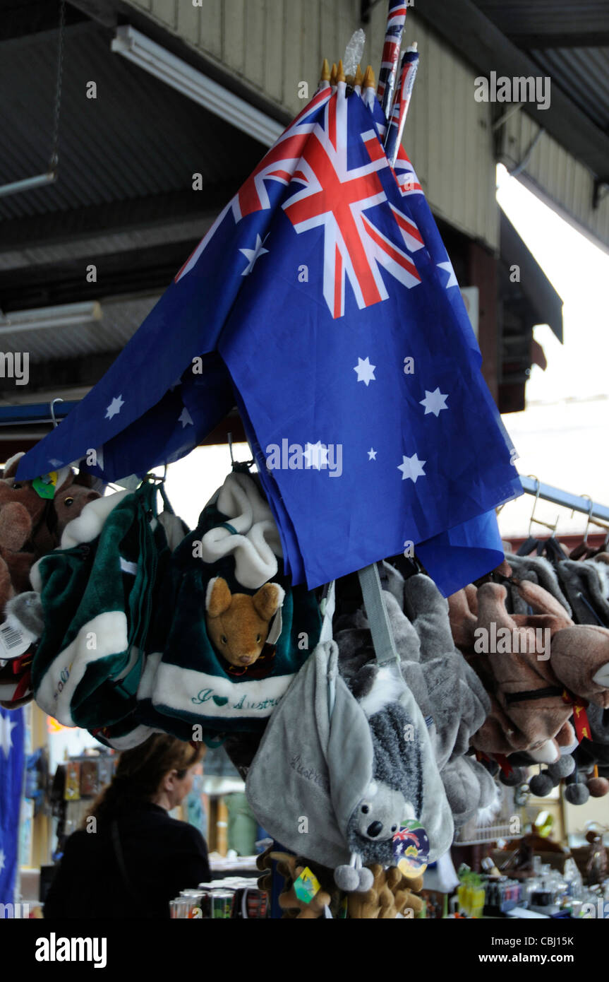 The Australian flag hangs at one of the souvenir stalls at Queen Victoria Market in Melbourne, Australia Stock Photo