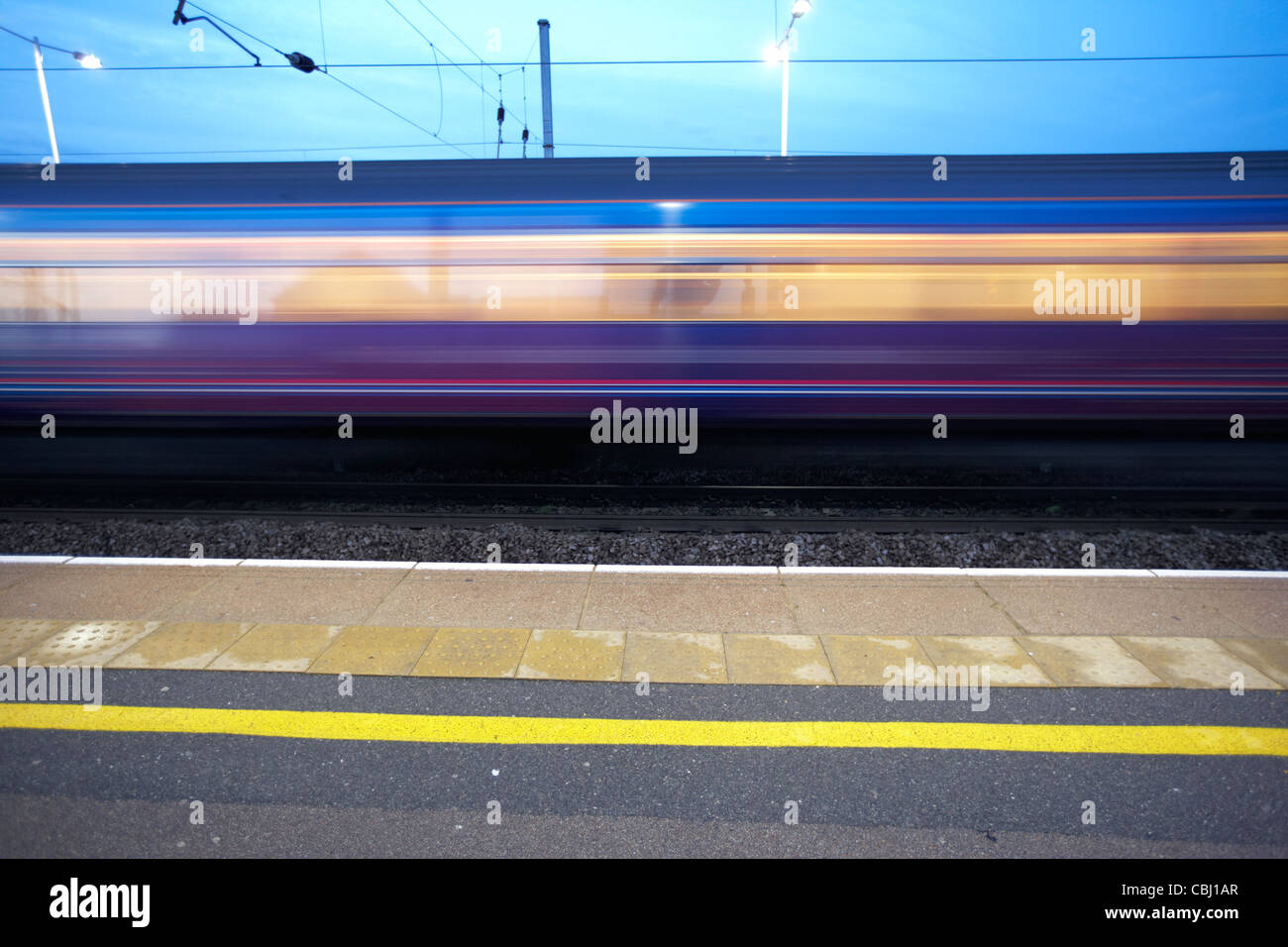 train rushing through cricklewood rail train station london england ...