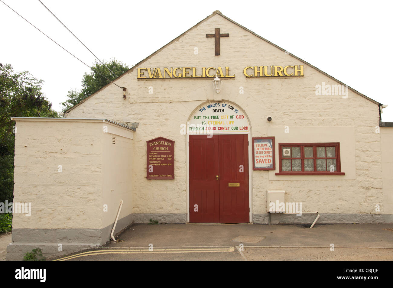 Evangelical church in Bridport, Dorset. The text above the door reads “The wages of sin is death”. England, United Kingdom. Stock Photo