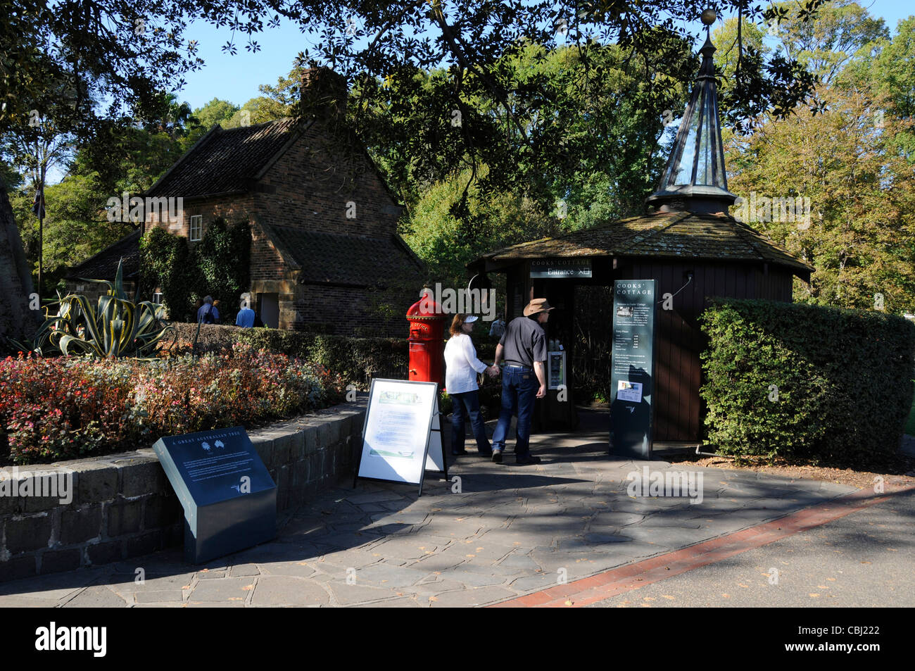 Visitors at the home of Captain James Cook, RN (Royal Navy) who discovered Australia, in Fitzroy Gardens, Melbourne, Australia. Stock Photo