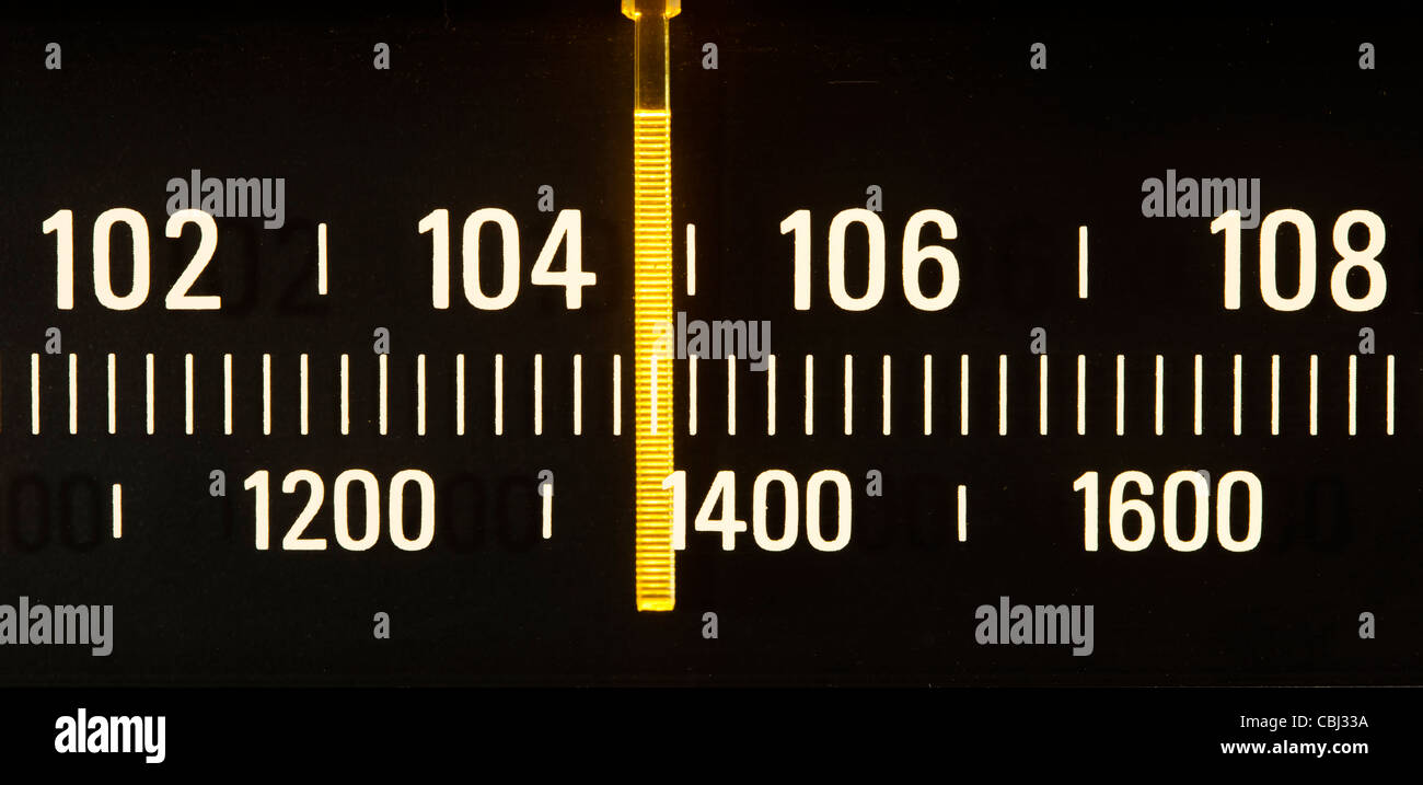 Illuminated display of an AM/FM tuner Stock Photo