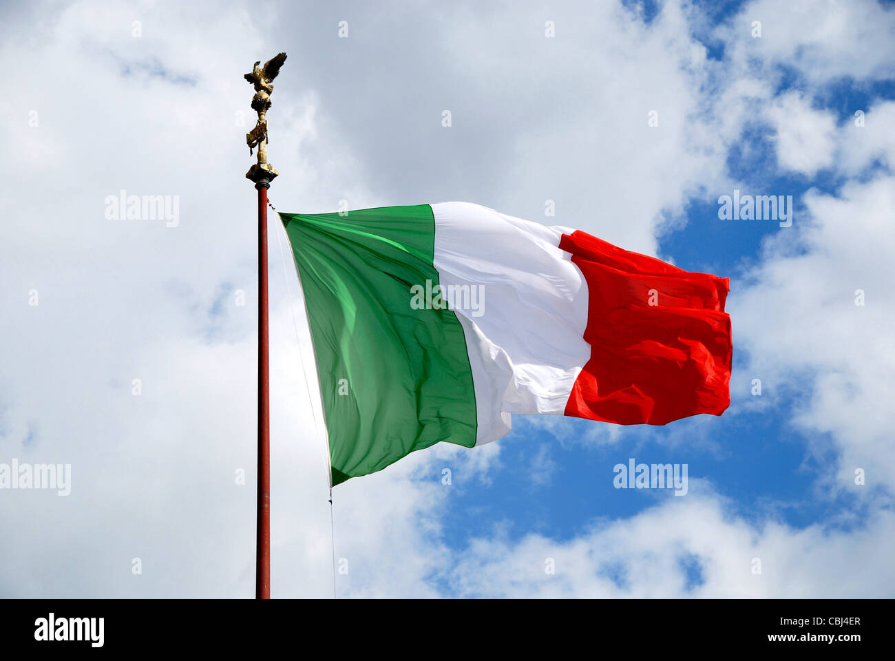 Italian flag at the National monument to king Viktor Emanuel II. and monument of the unknown soldier in Rome. Stock Photo