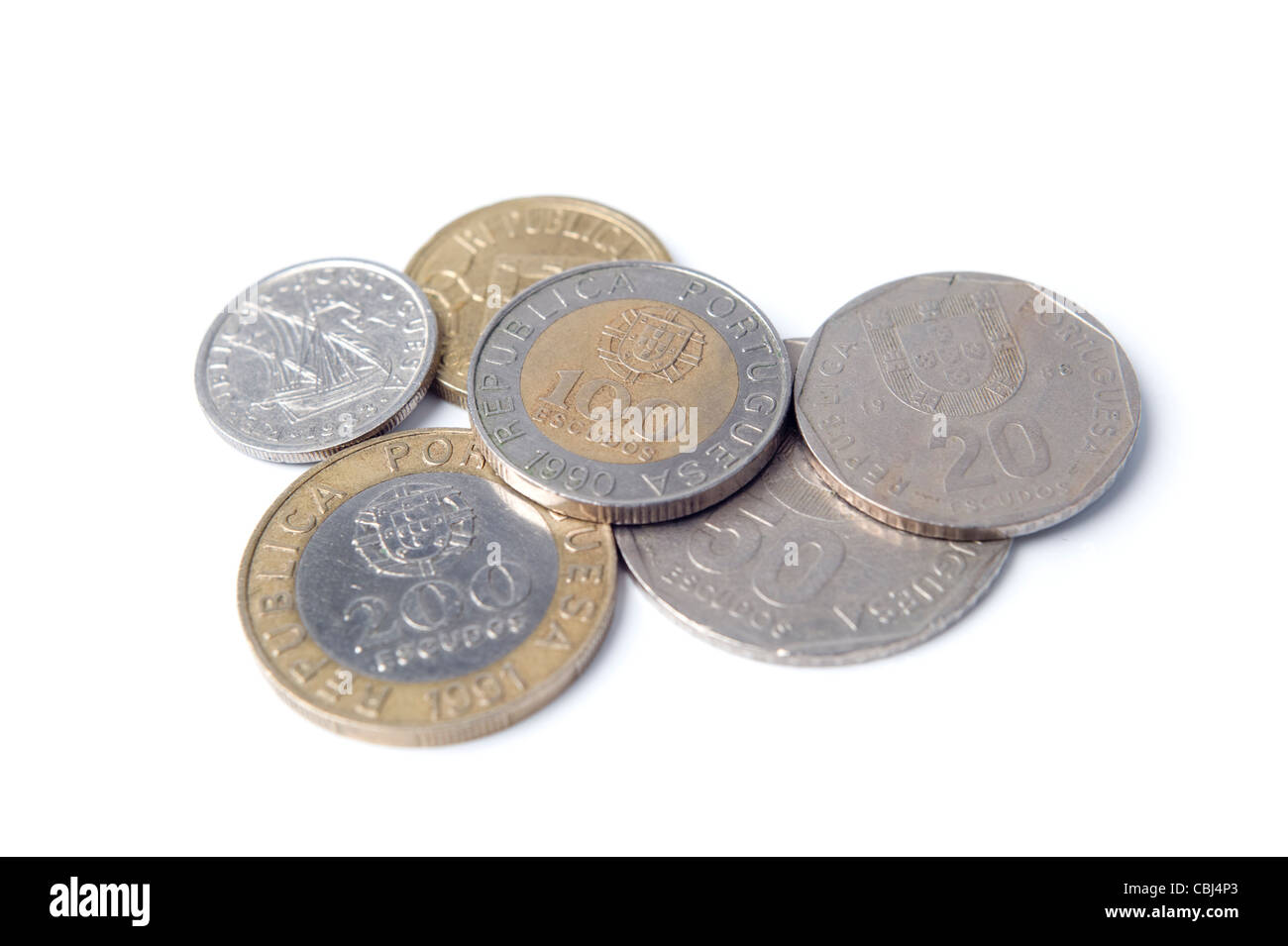 Old portuguese Escudo coins on white background Stock Photo