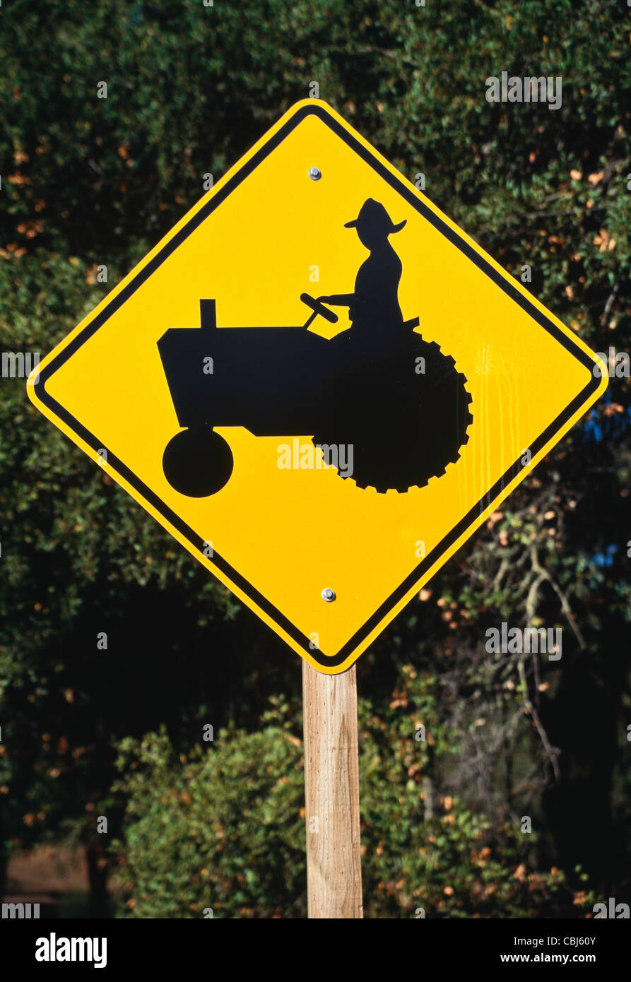 Rural Tractor on Highway Traffic Sign Stock Photo