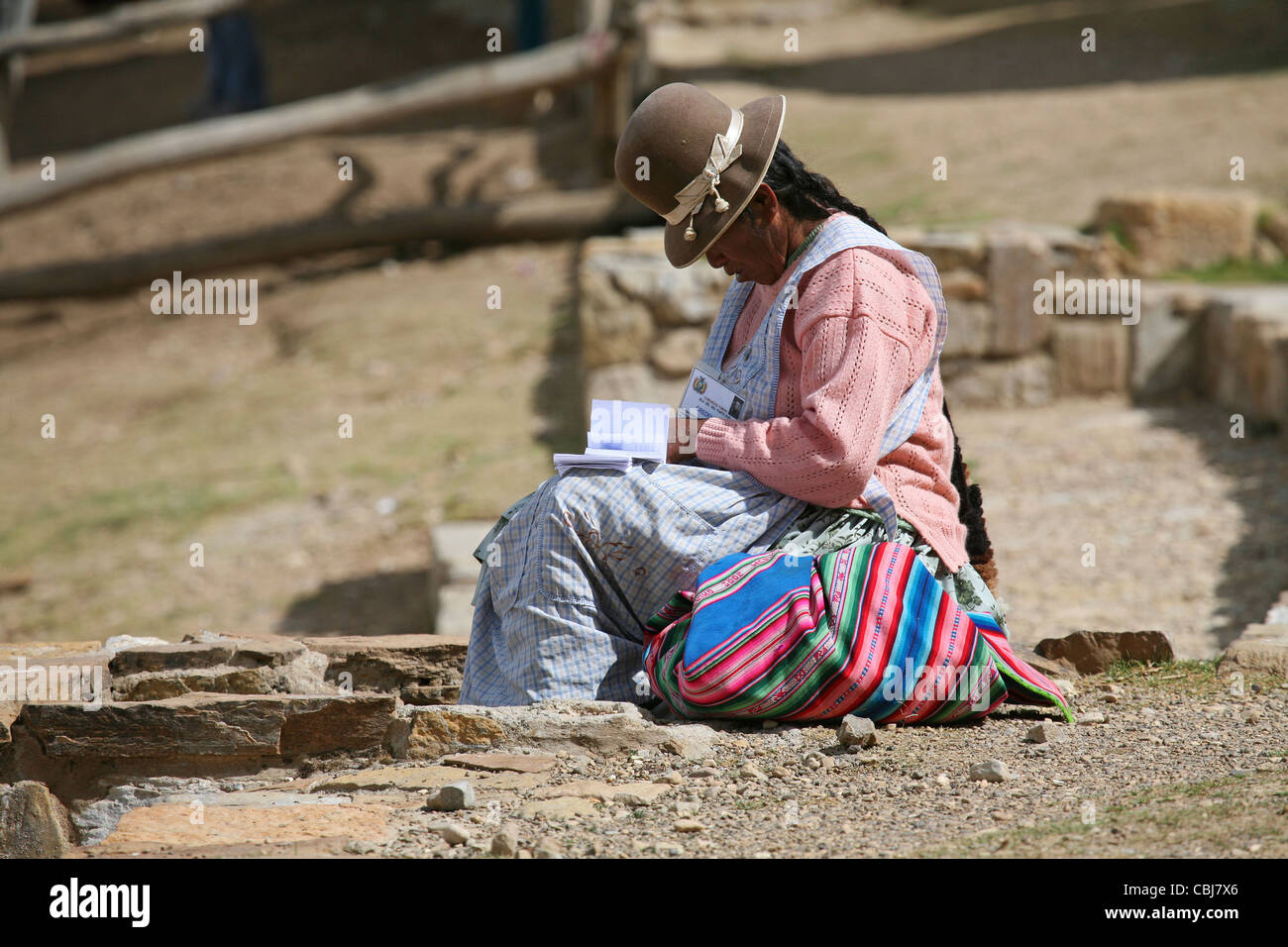 Traditional dressed native Bolivian woman with bowler hat in Bolivia Stock Photo