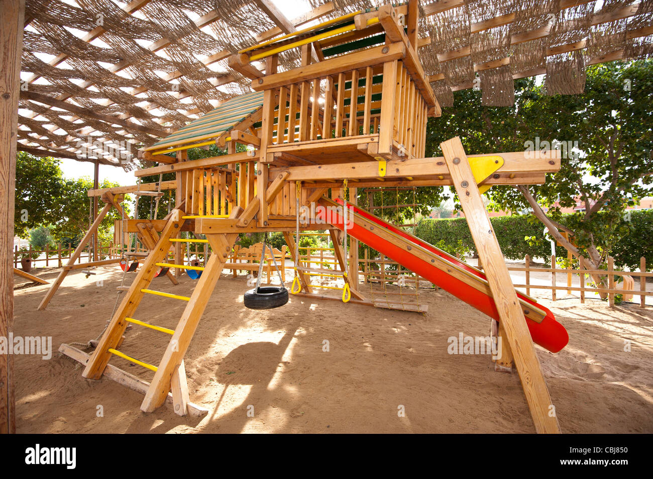 childrens wooden climbing frame with slide