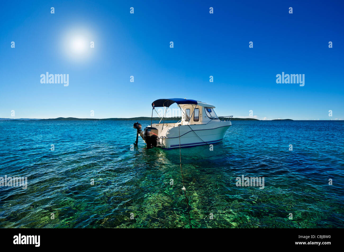 landscape of lonely boat on adriatic sea Stock Photo