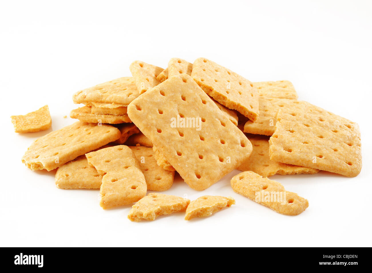 broken cracker on white background Stock Photo - Alamy