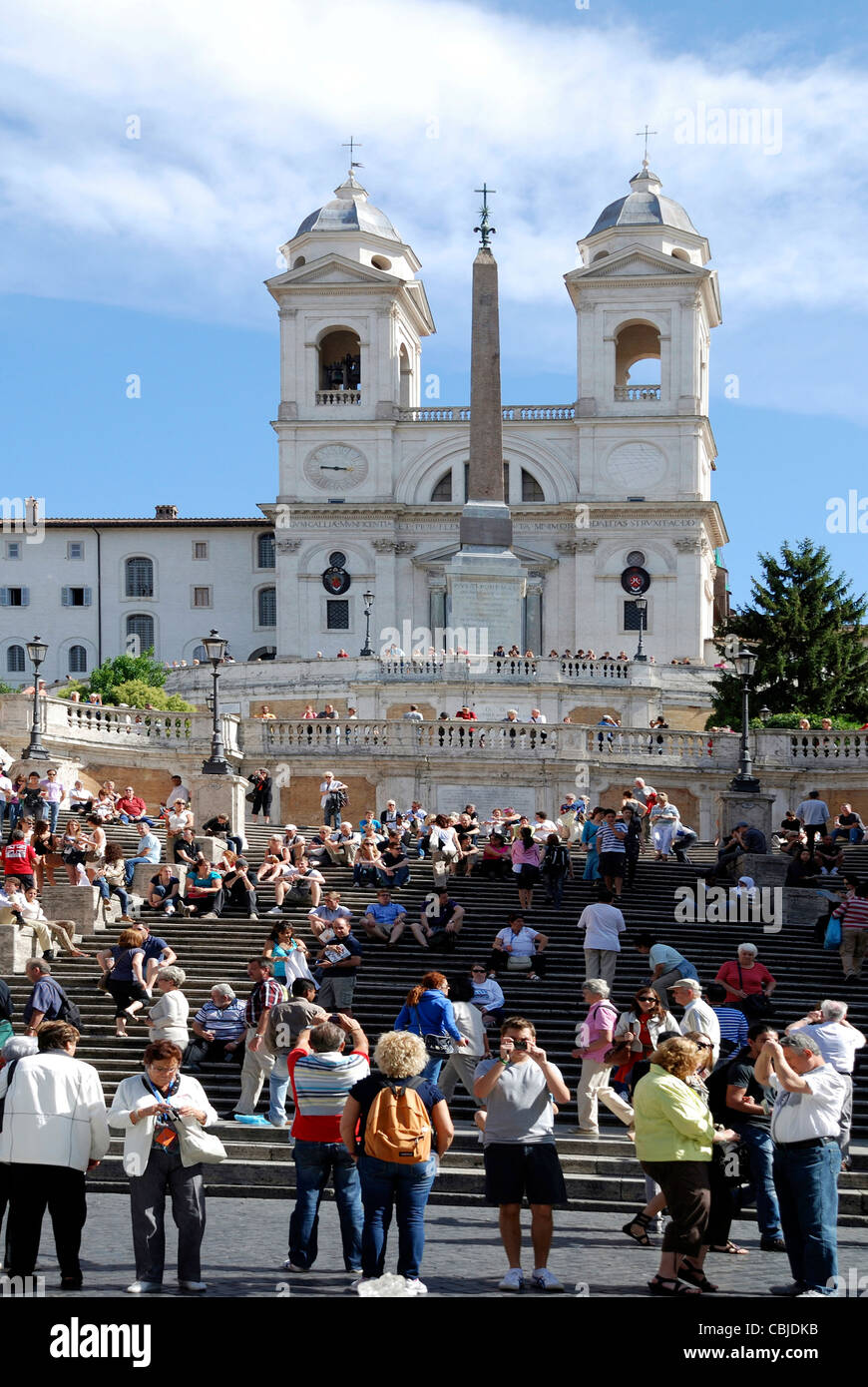 Spanish steps of the Piazza di Spagna in Rome with the church Trinita dei Monti. Stock Photo