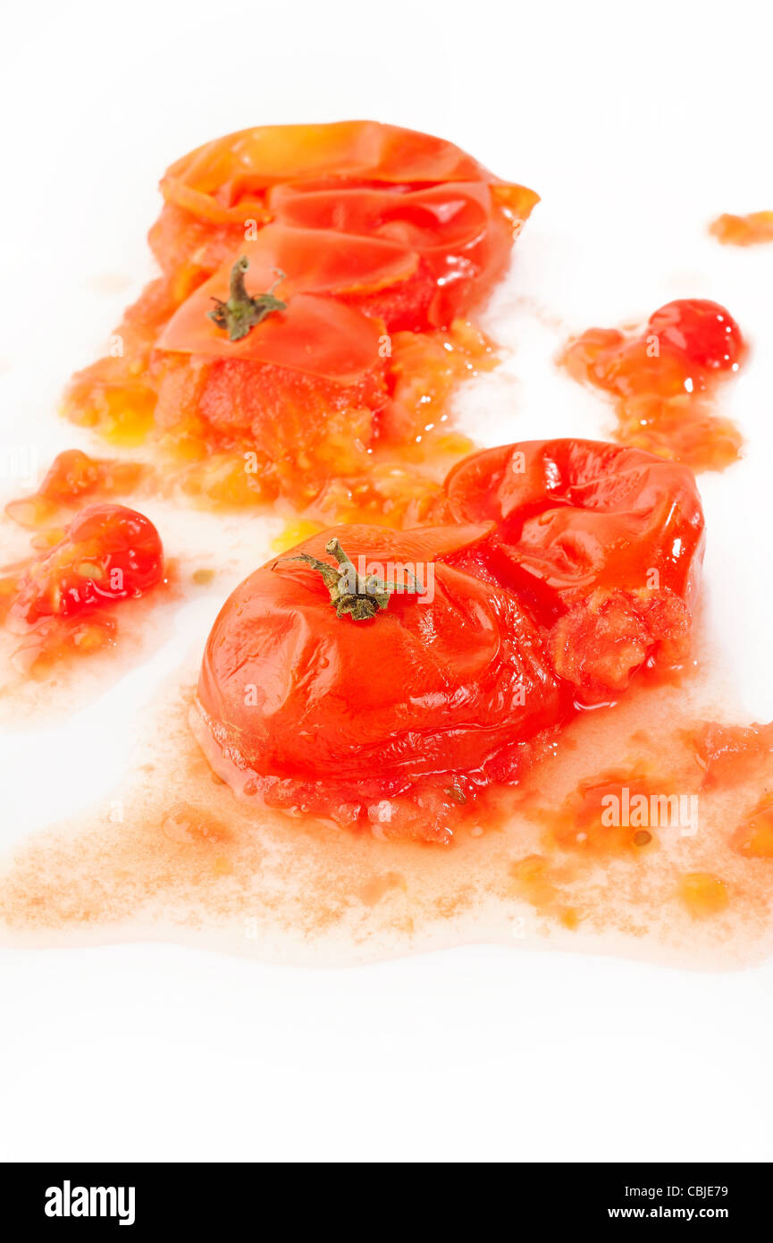 splattered tomato on white Stock Photo