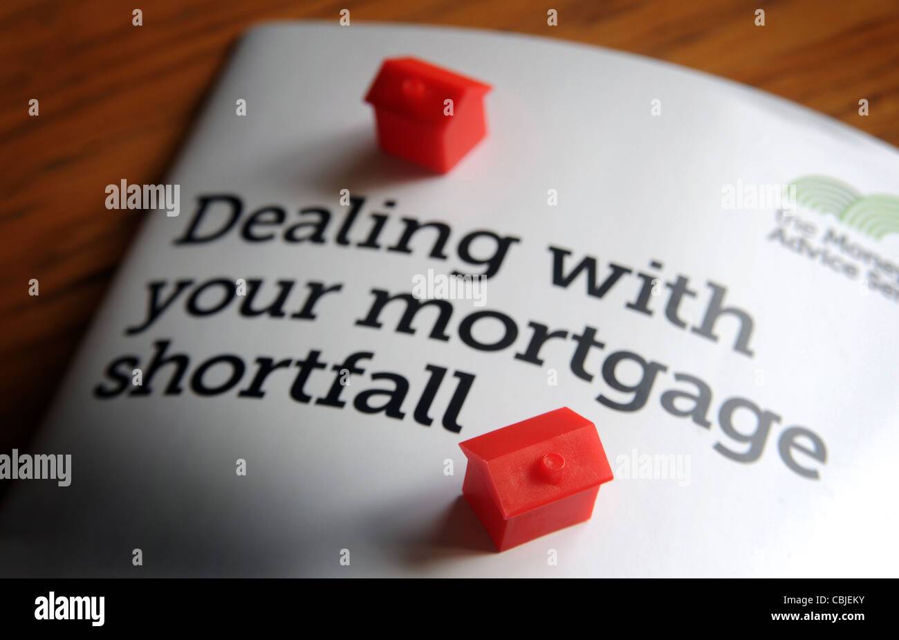 DEALING WITH YOUR MORTGAGE SHORTFALL INFO LEAFLET WITH MODEL HOUSES RE ENDOWMENT MORTGAGE SHORTFALL MORTGAGES NEGATIVE EQUITY UK Stock Photo