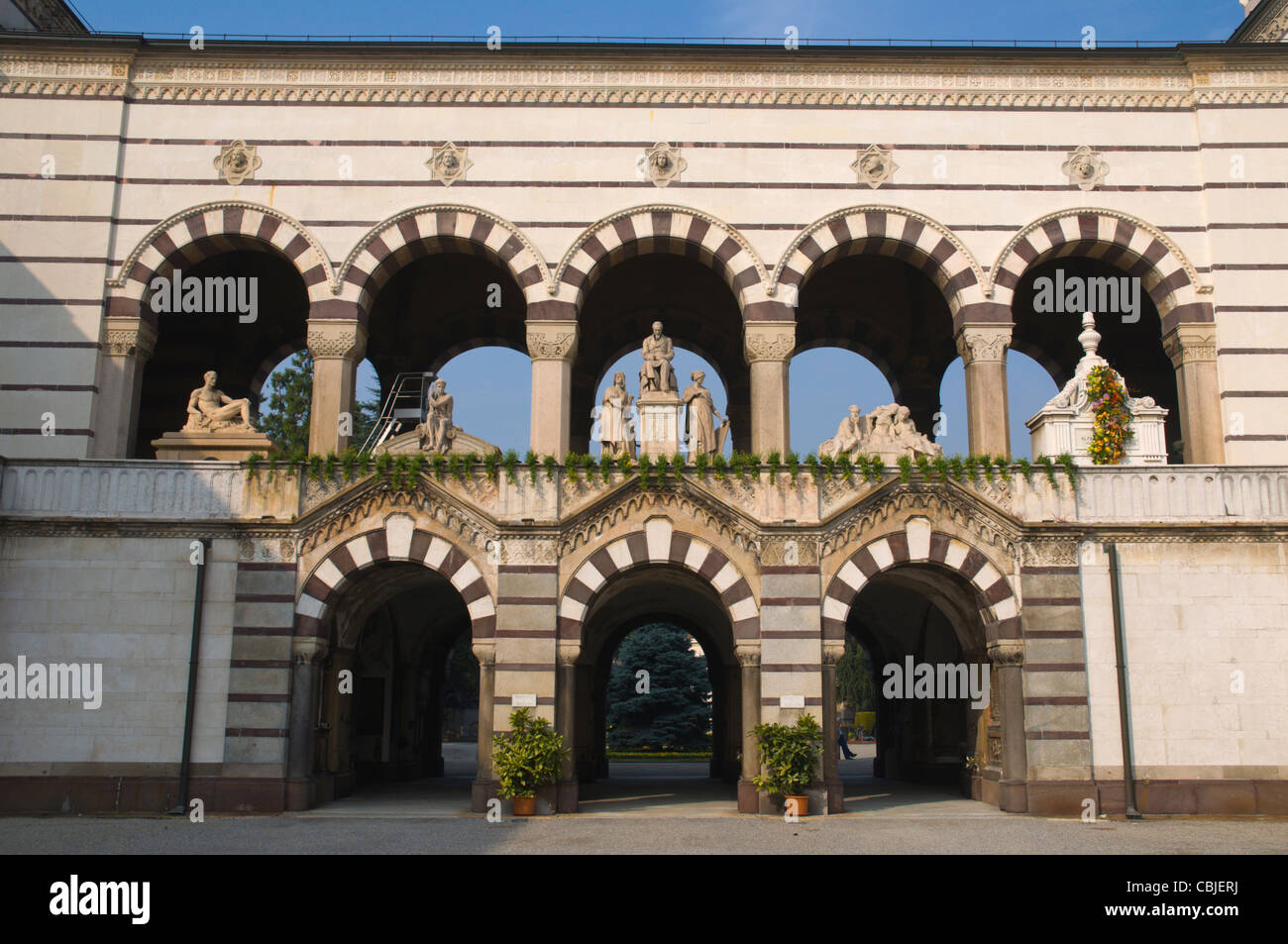 Gates to Cimitero Monumentale cemetery Milan Lombardy region Italy Europe Stock Photo