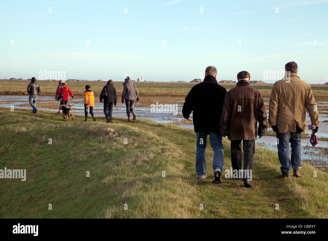 People walking the Suffolk Coast path at Orford, Suffolk UK Stock Photo