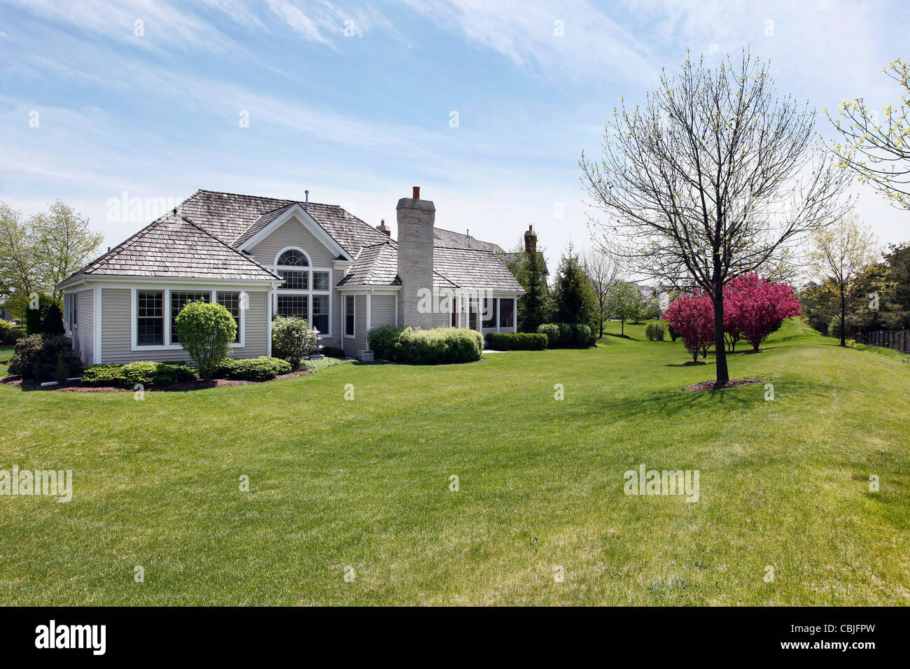 Rear view of suburban home with large back yard Stock Photo Alamy