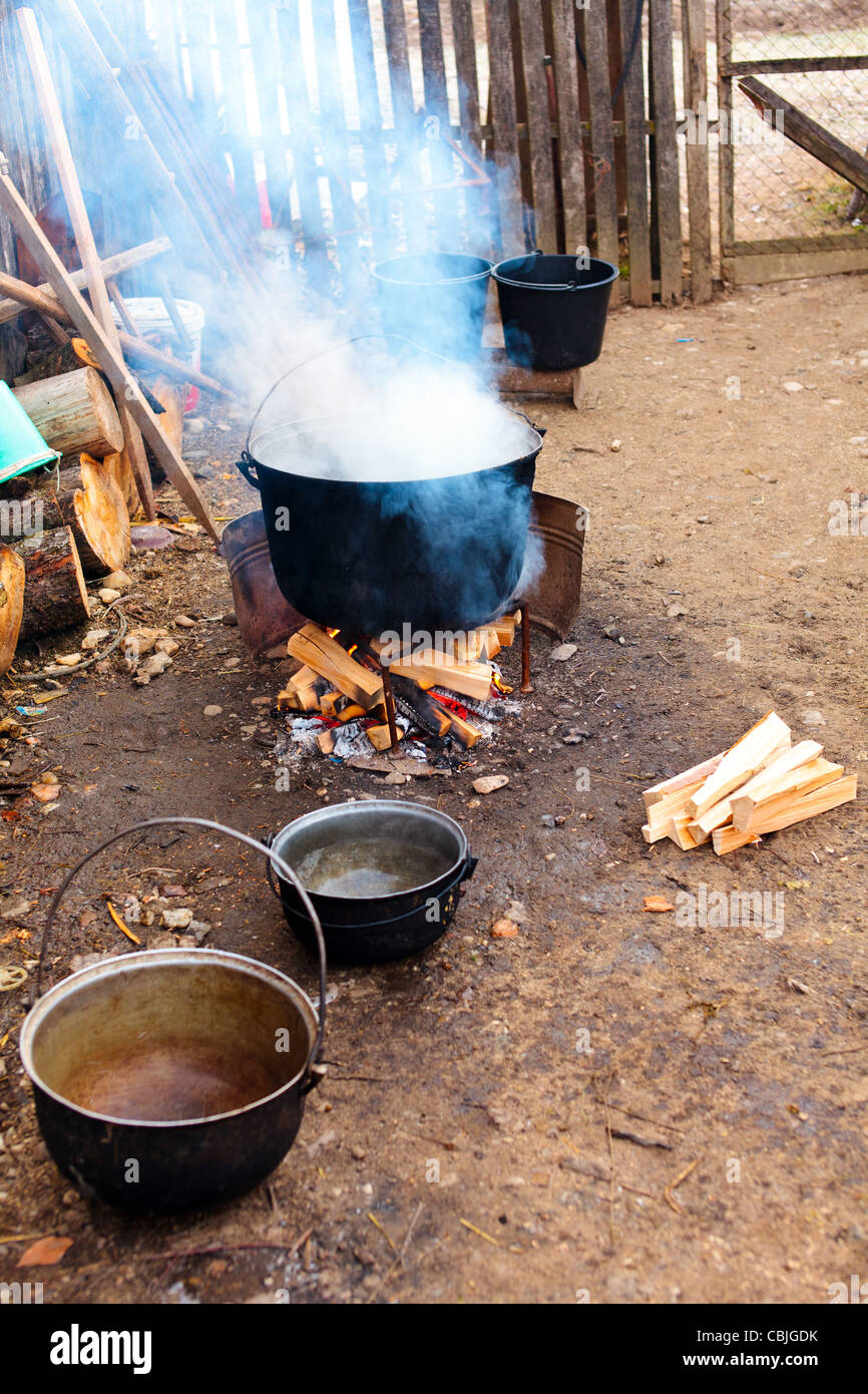 Castiron pot boiling water outdoor in the countryside Stock Photo Alamy