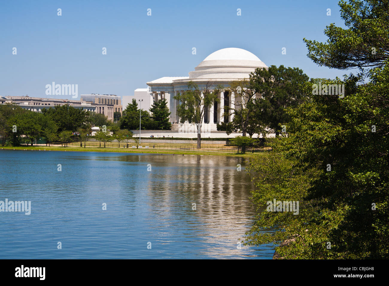 View of Thomas Jefferson Memorial with a reflection in the tidal basin of the Potomac River. Stock Photo