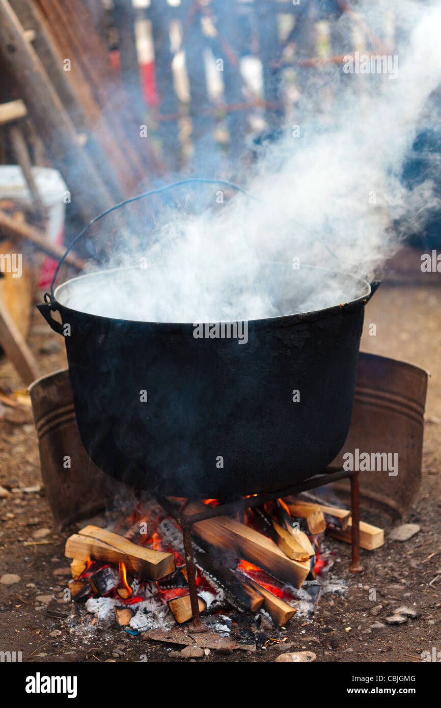 Castiron pot boiling water outdoor in the countryside Stock Photo Alamy
