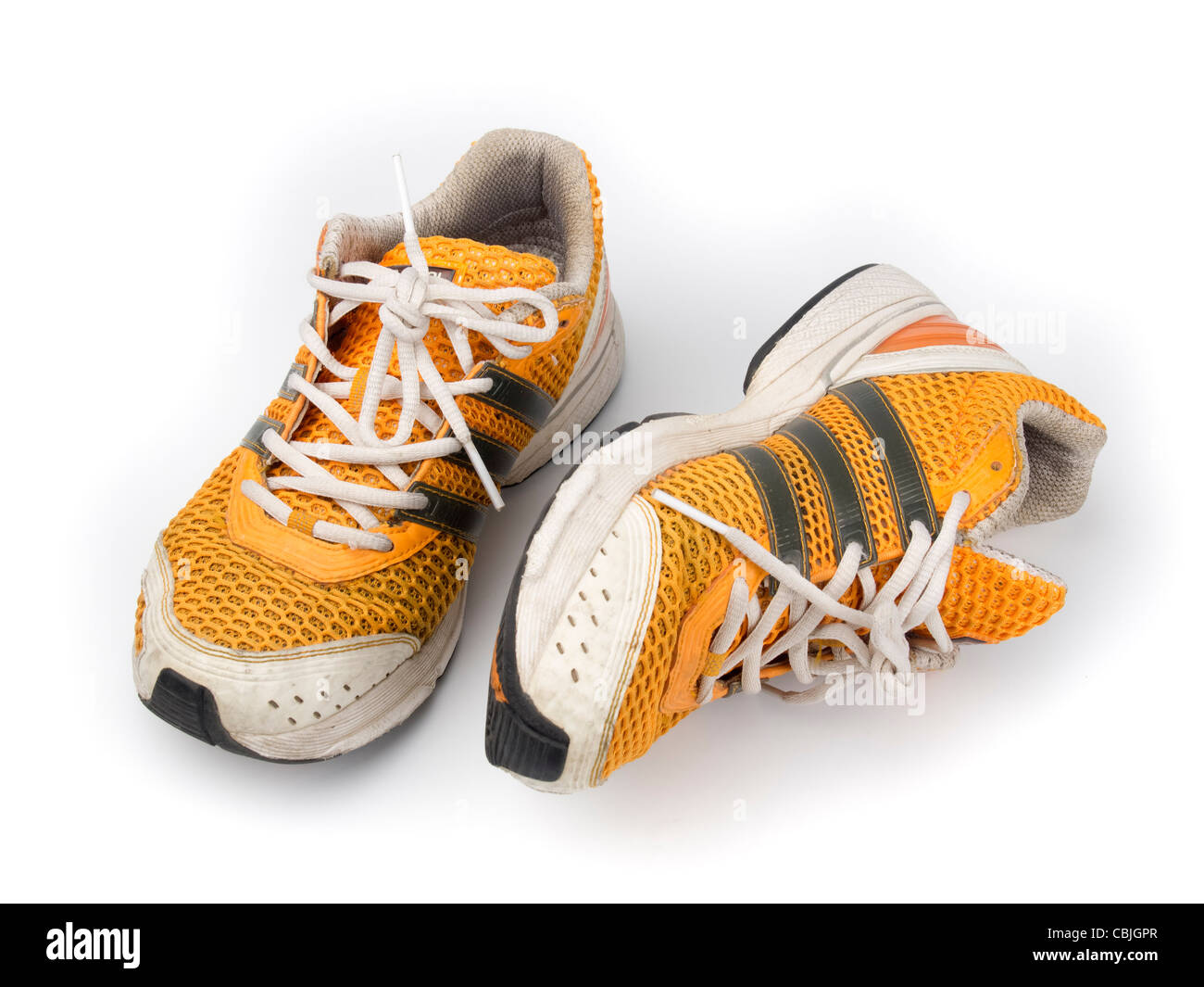 Orange Adidas running shoes Stock Photo - Alamy