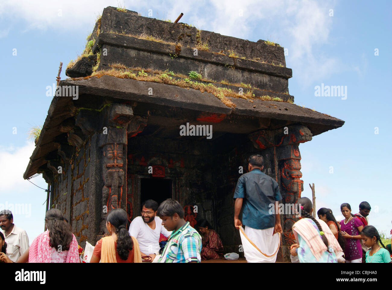 Lot of pilgrims Visiting Sarvajnapeedam Mandapam in Lush Green Kodachadri Hills Stock Photo