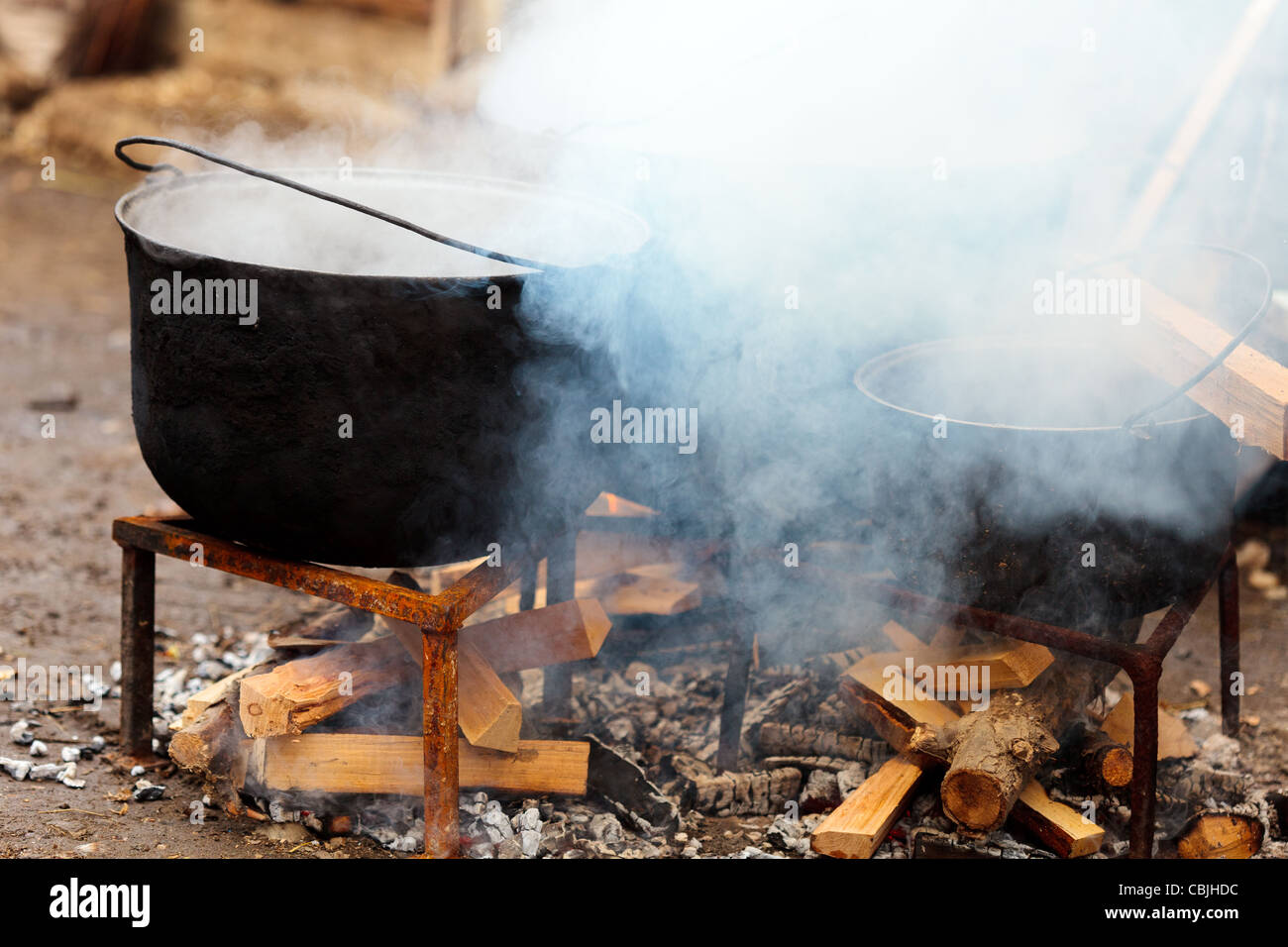 Castiron pot boiling water outdoor in the countryside Stock Photo Alamy