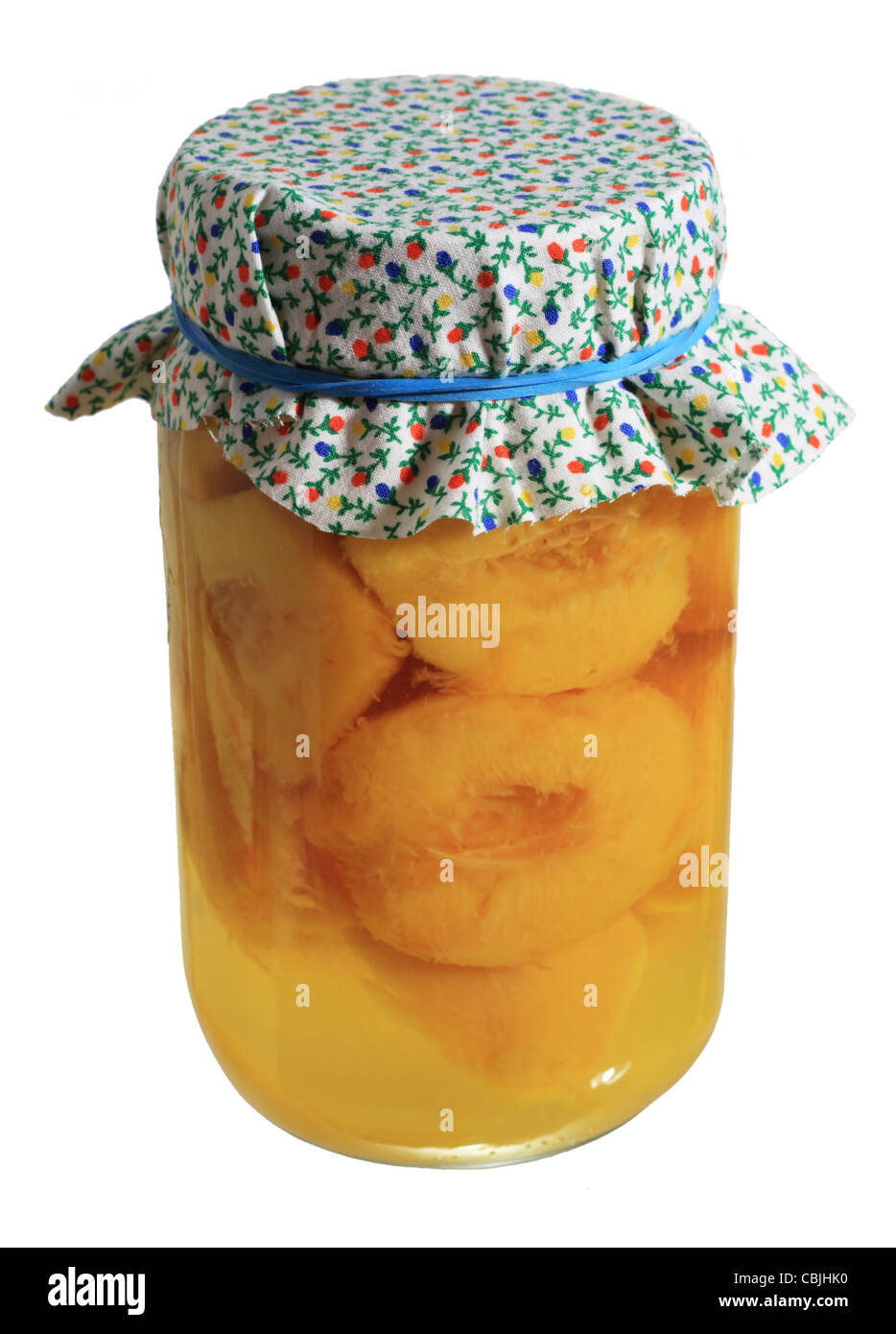 jar of home canned peaches isolated on white Stock Photo