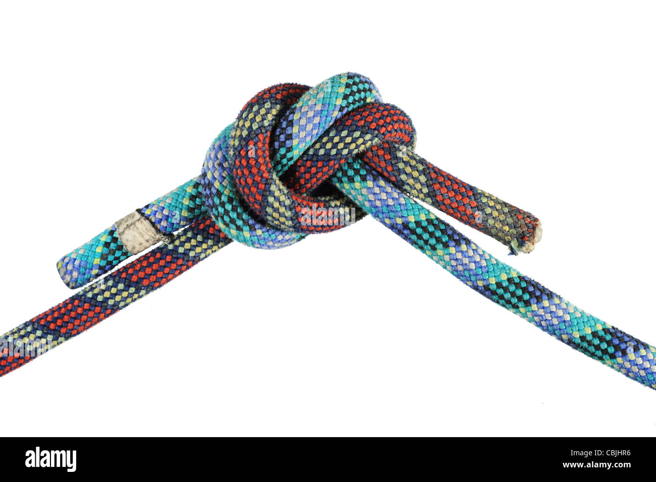 overhand knot in red and blue climbing ropes isolated on white Stock Photo