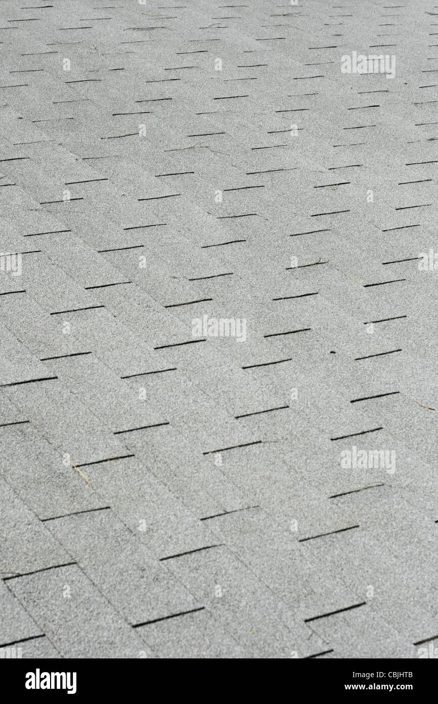 Diagonal background of gray roof shingles Stock Photo