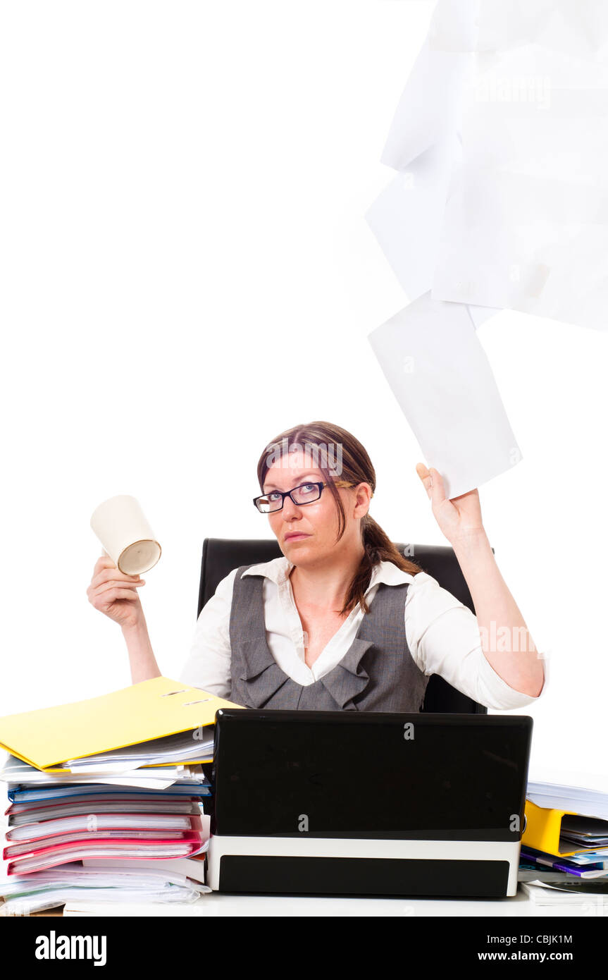 women stressed doing paper work Stock Photo