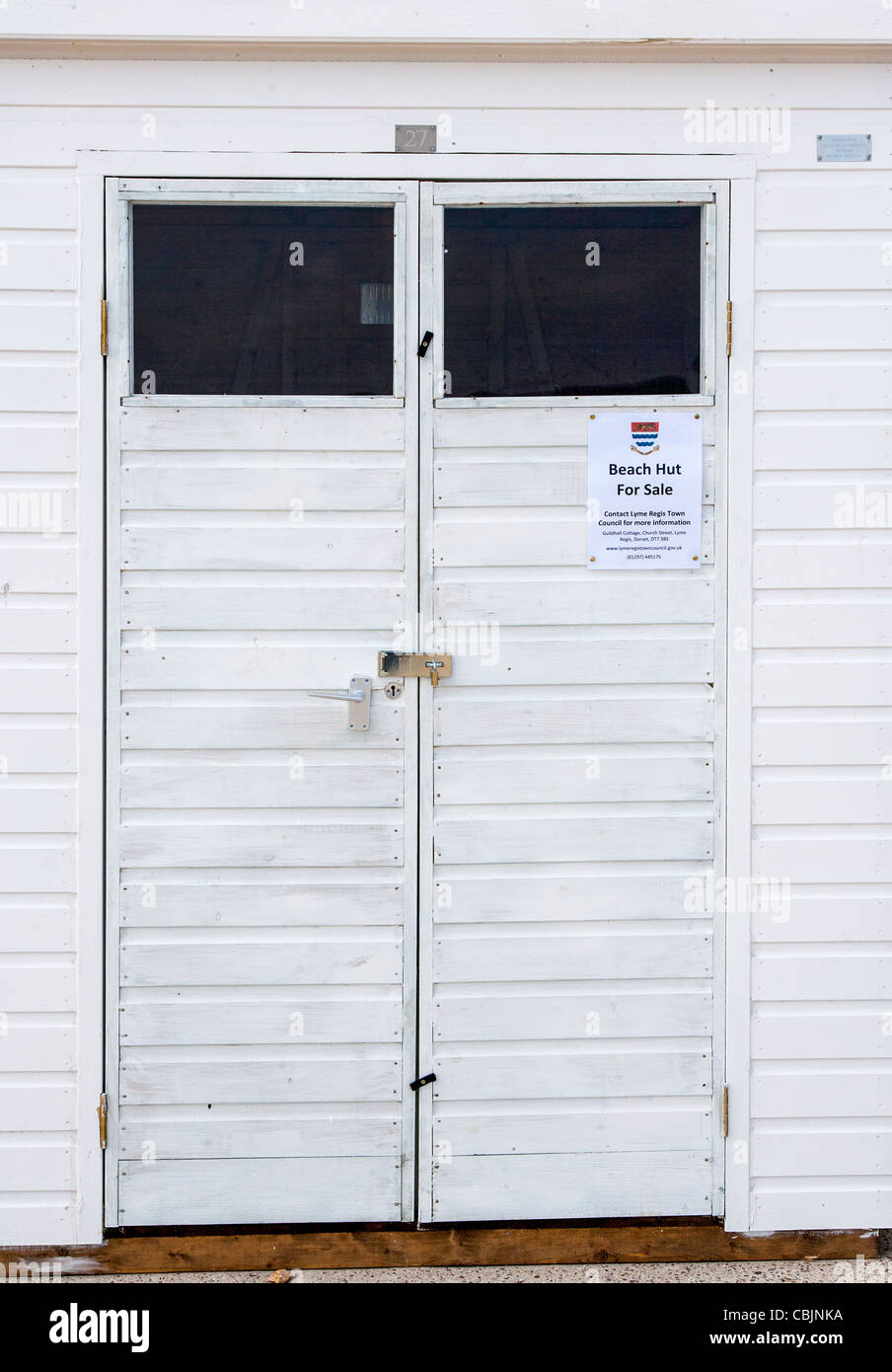 Beach hut for sale sign in Lyme Regis, Dorset, England Stock Photo Alamy