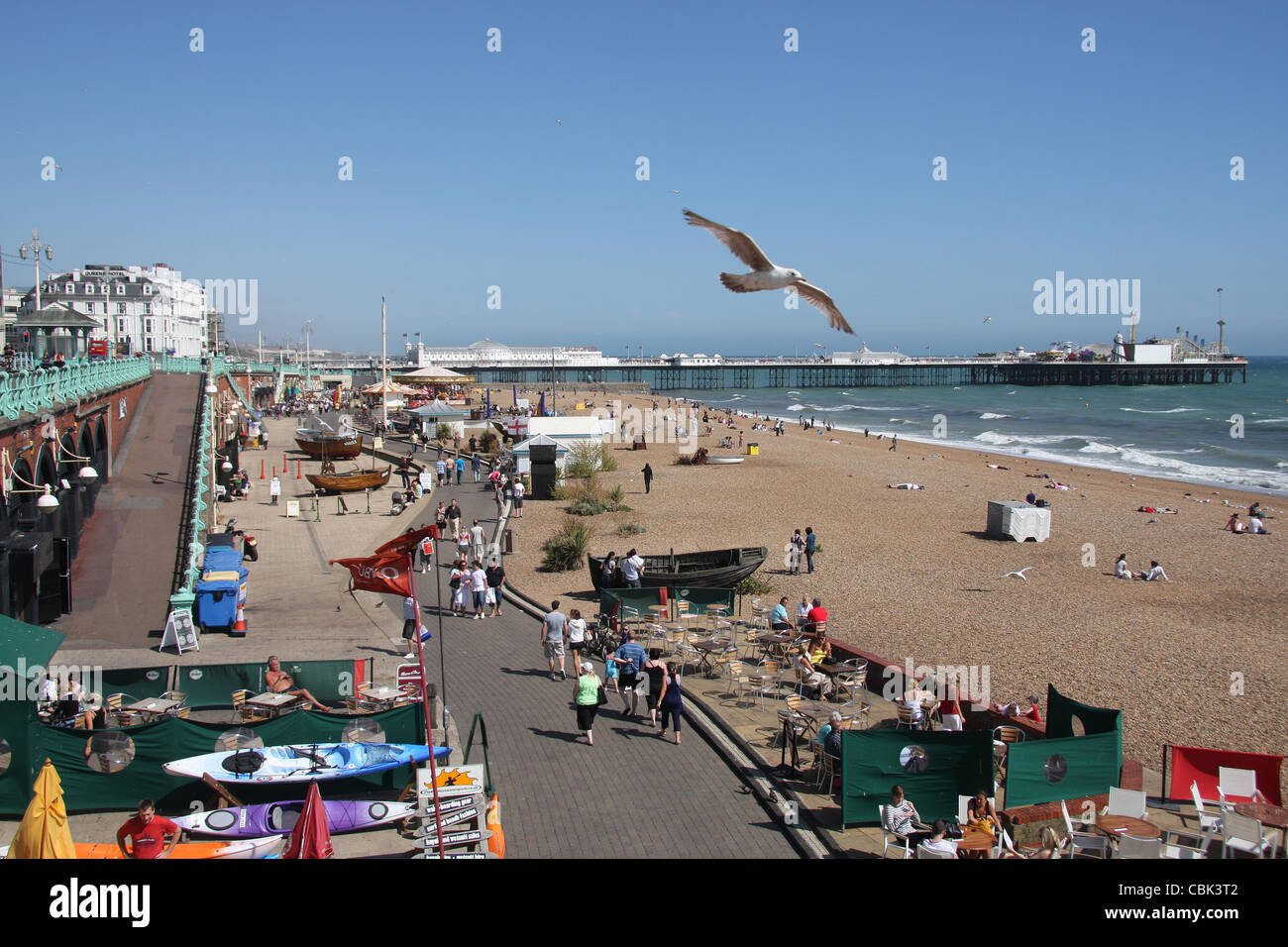Beach activities, the Brighton Fishing Museum and Brighton Pier from the beach promenade at the foot of MIddle Street, Brighton Stock Photo