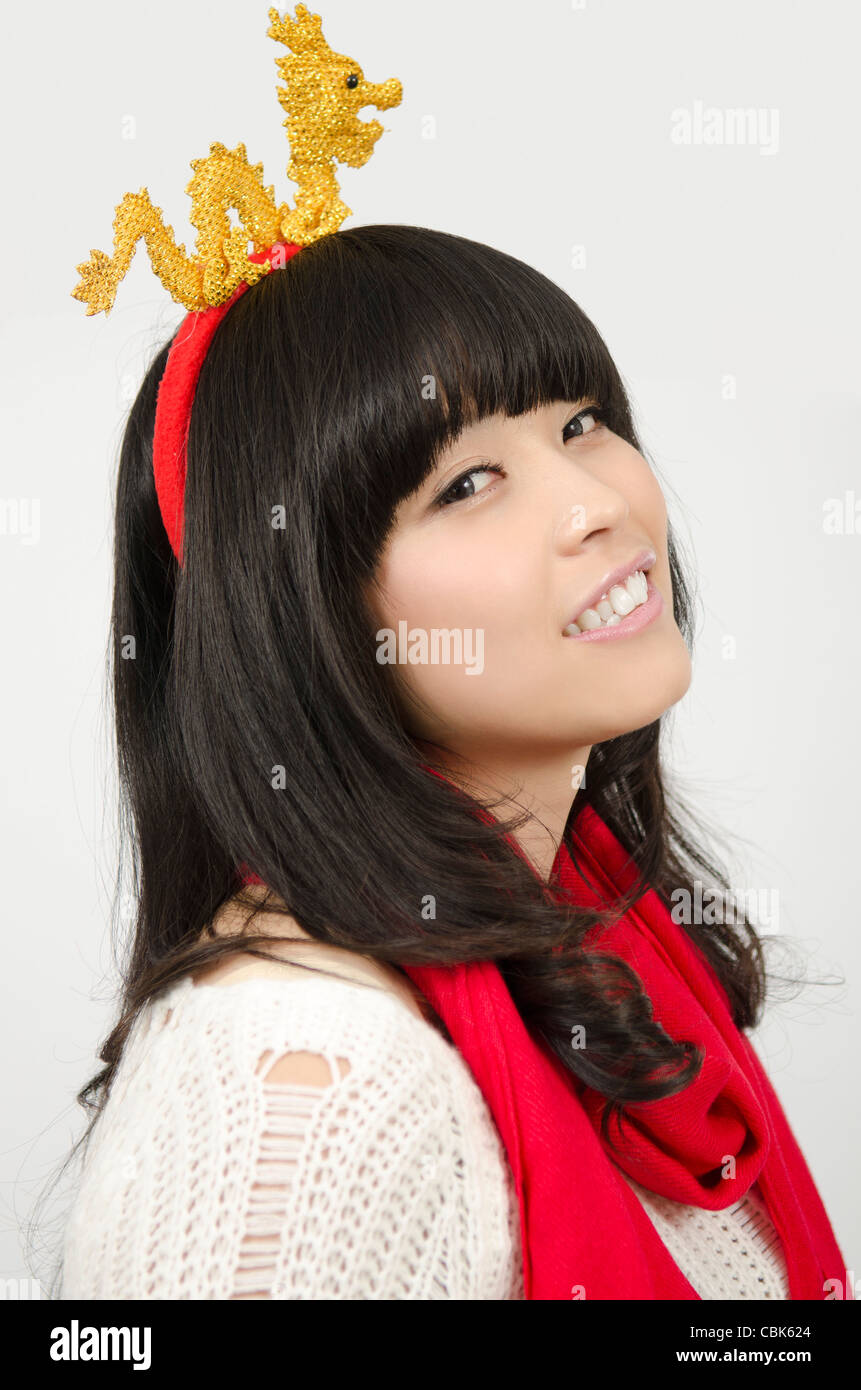 Asian Young Girl Happy Chinese New years and Christmas coming Stock Photo