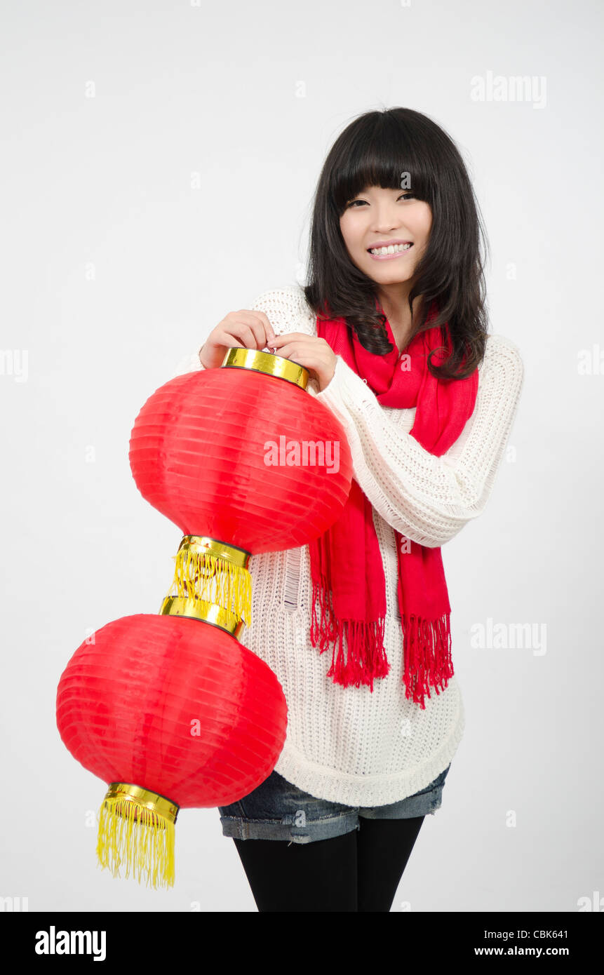 Asian Young Girl Happy Chinese New years and Christmas coming Stock Photo