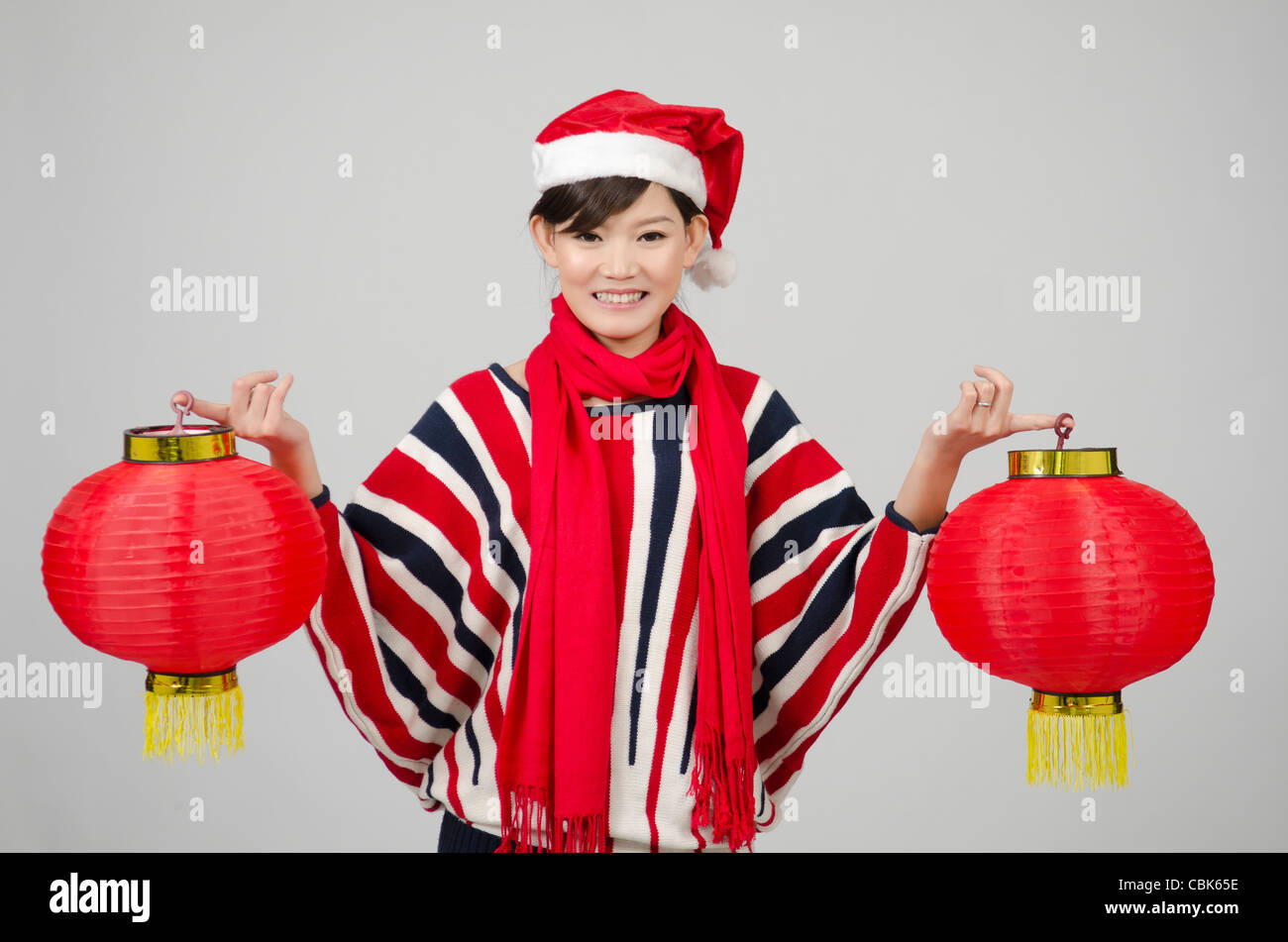 Asian Young girl Happy with Chinese New year and Christmas Coming Stock Photo