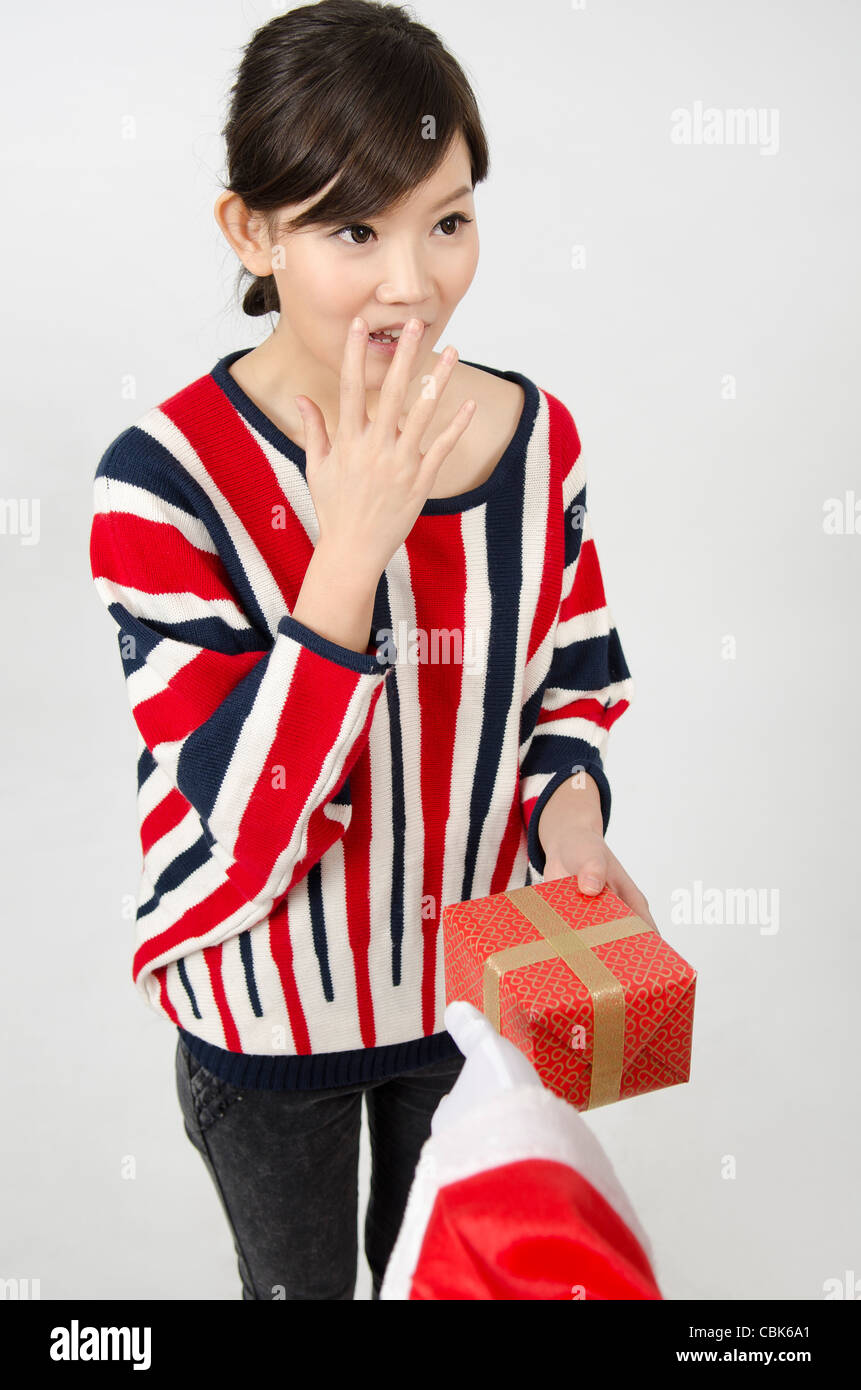 Asian Young girl Happy with Chinese New year and Christmas Coming Stock Photo