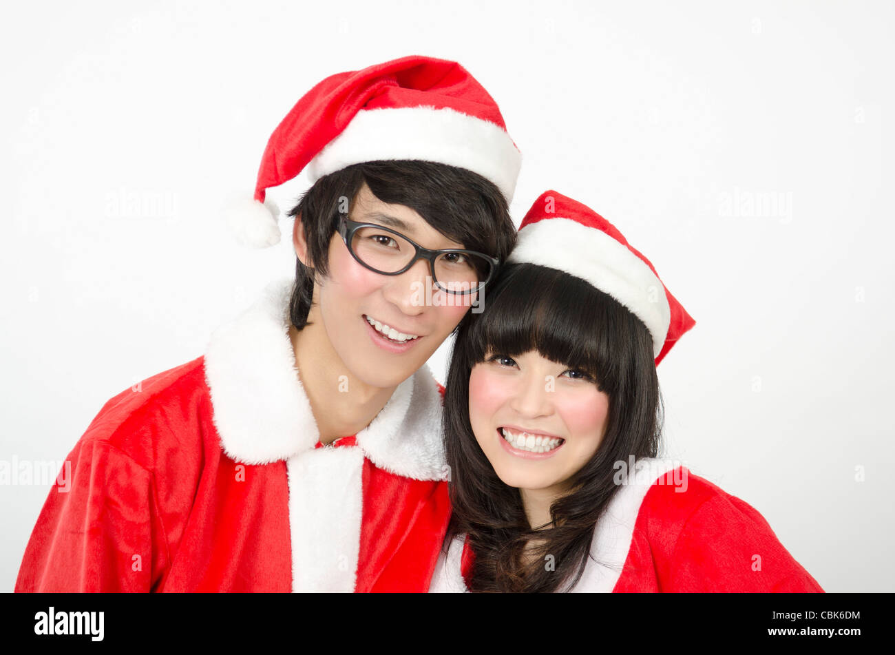 Asian Young Couple Happy With Christmas Coming Stock Photo