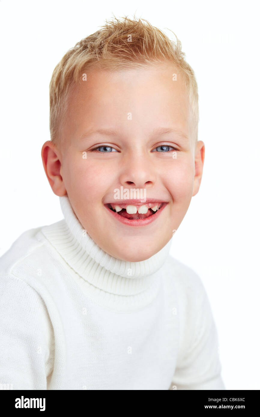 Portrait of cute boy smiling while looking at camera Stock Photo - Alamy