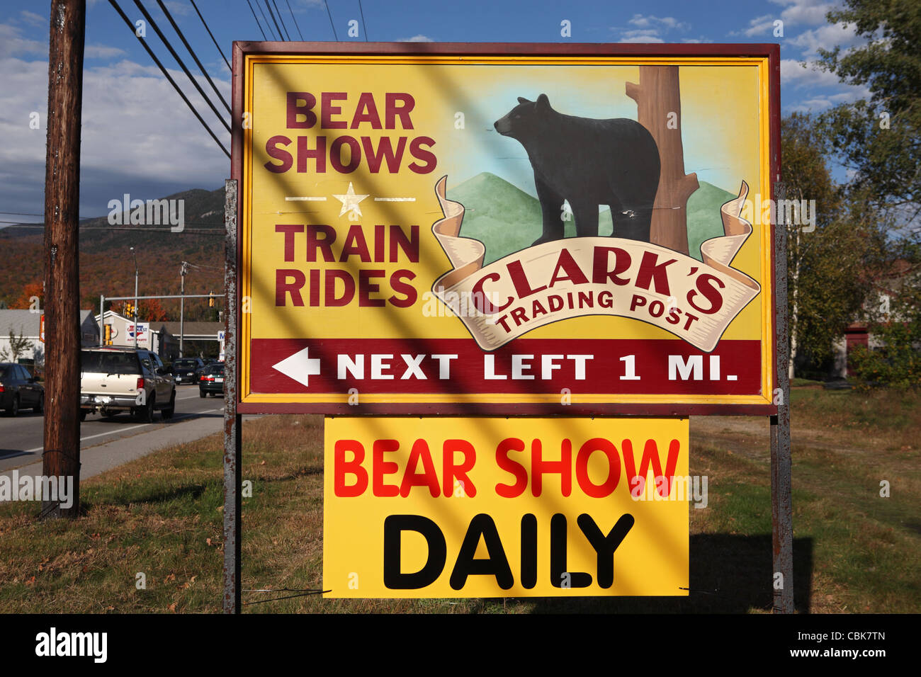 Road side sign advertising train rides and bear shows and Clark's Trading Post, Lincoln, New Hampshire, USA Stock Photo