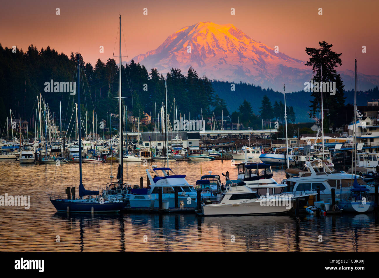Evening at the harbor in Gig Harbor, WA. Mount Rainier looming in the background. Stock Photo